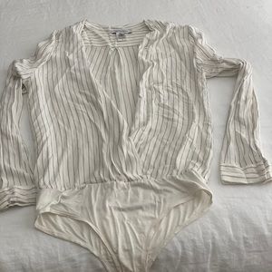 Light fabric body suit